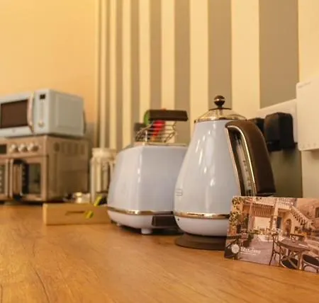 Flat By Talbot & Bons *